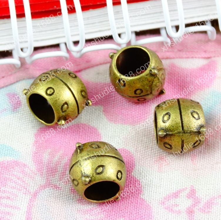Perlas de metal en forma de estrella en Antik bronce colores 20 unidades de vintageparts