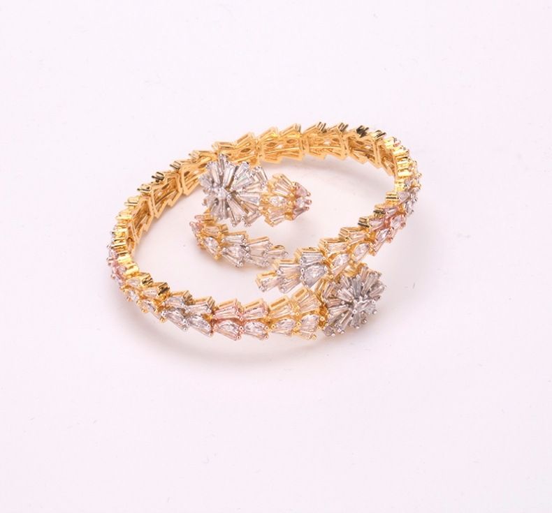 Gouden sets (armbanden + ring)