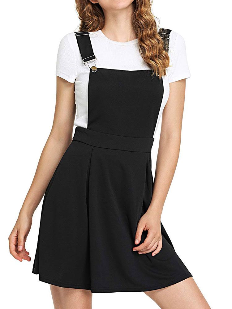 black pleated pinafore dress
