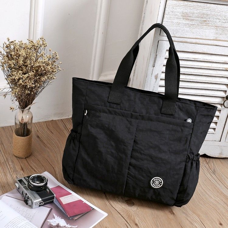 bolso impermeable mujer