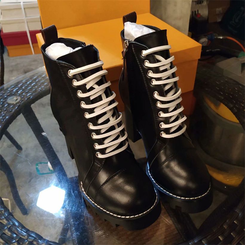 black boots with white laces