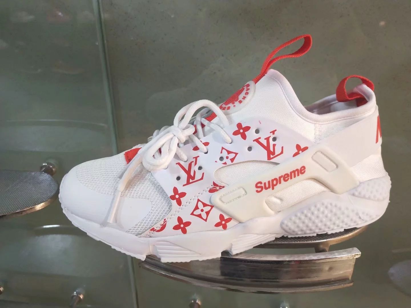 supreme huaraches louis vuitton