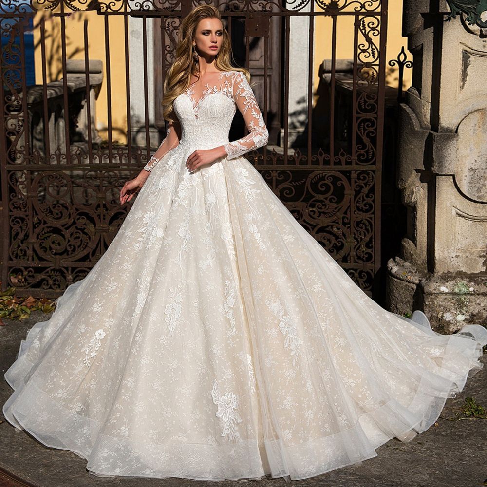 Sheer manga larga Una línea de vestidos de boda Vestidos de Novia para Boda Real Modest Sheer manga larga Una línea de vestidos de boda Vestidos de Novia para Boda Real Modest