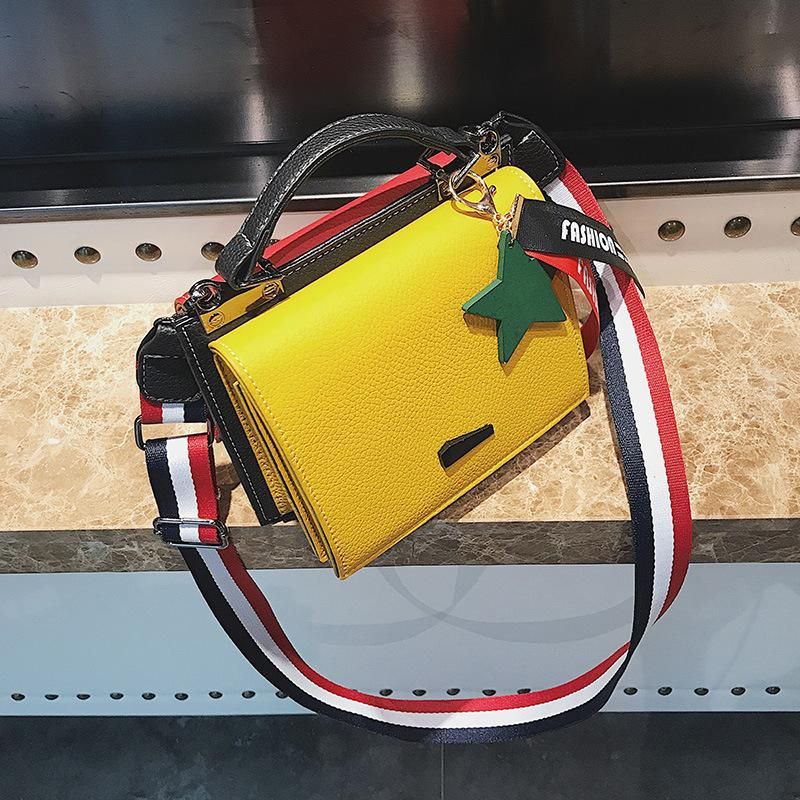 handbag with wide shoulder strap