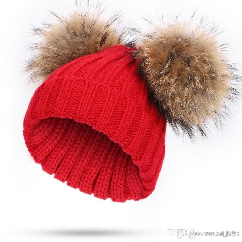 boys red bobble hat