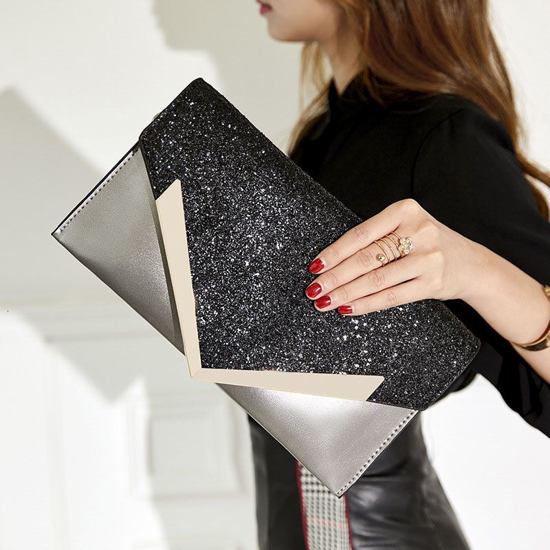 pink and gold clutch bag