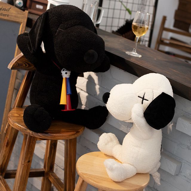 black snoopy doll