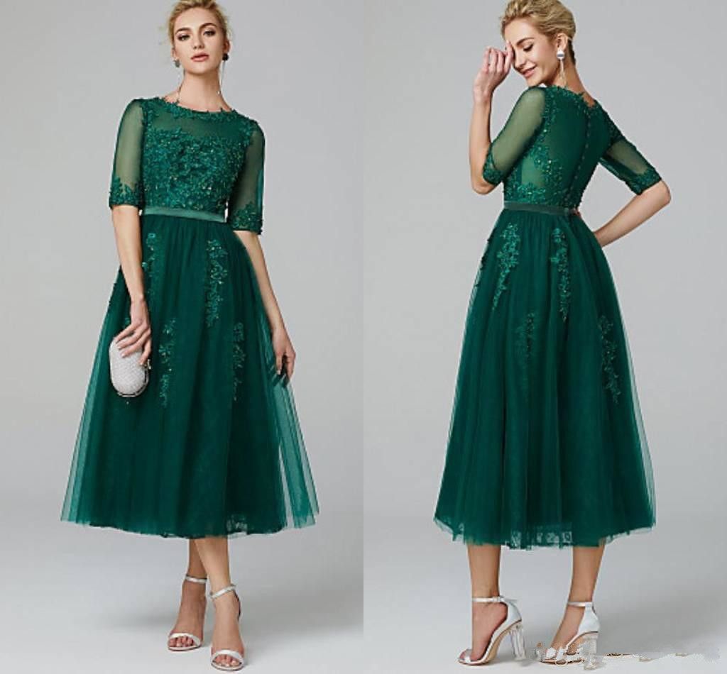 dark green tea length dress