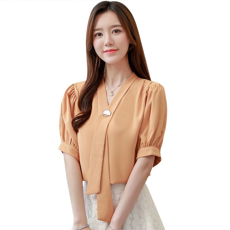 La nueva llegada de las mujeres camisas de cuello V cuello arco blusas de la gasa La nueva llegada de las mujeres camisas de cuello V cuello arco blusas de la gasa