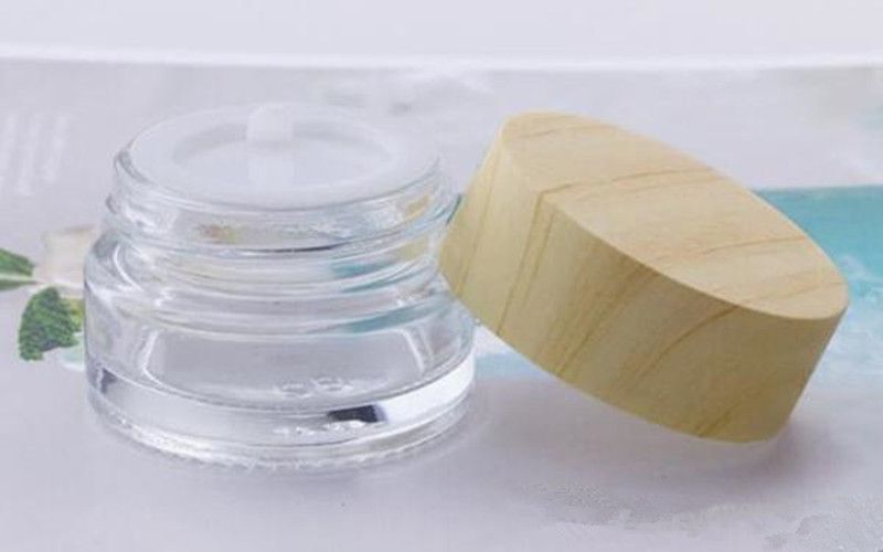 蒸し5Gガラス瓶透明な5mlの小型小さい化粧品ガラスの瓶の容器のワックスクリーム濃縮物の木の穀物のプラスチックのふたが付いている隠された封入を￥118  DHgate