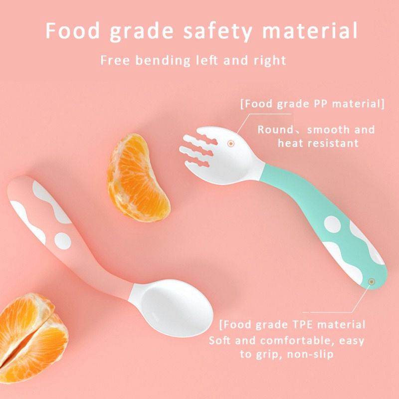 baby learning spoon