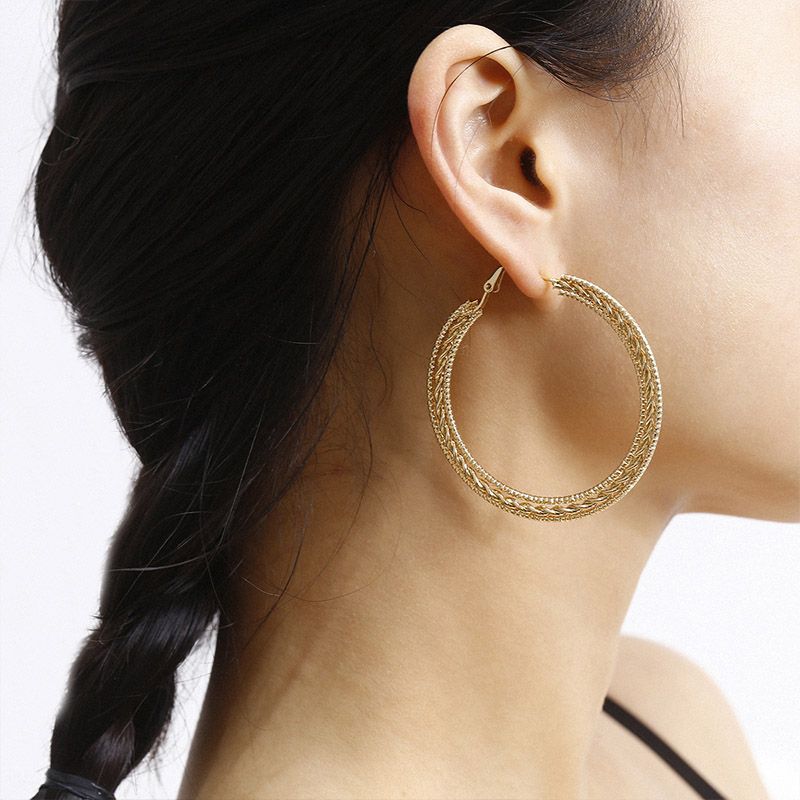 25 Best Hoop Earrings Of 2022 WWD Sliver Gold Color Big Bamboo