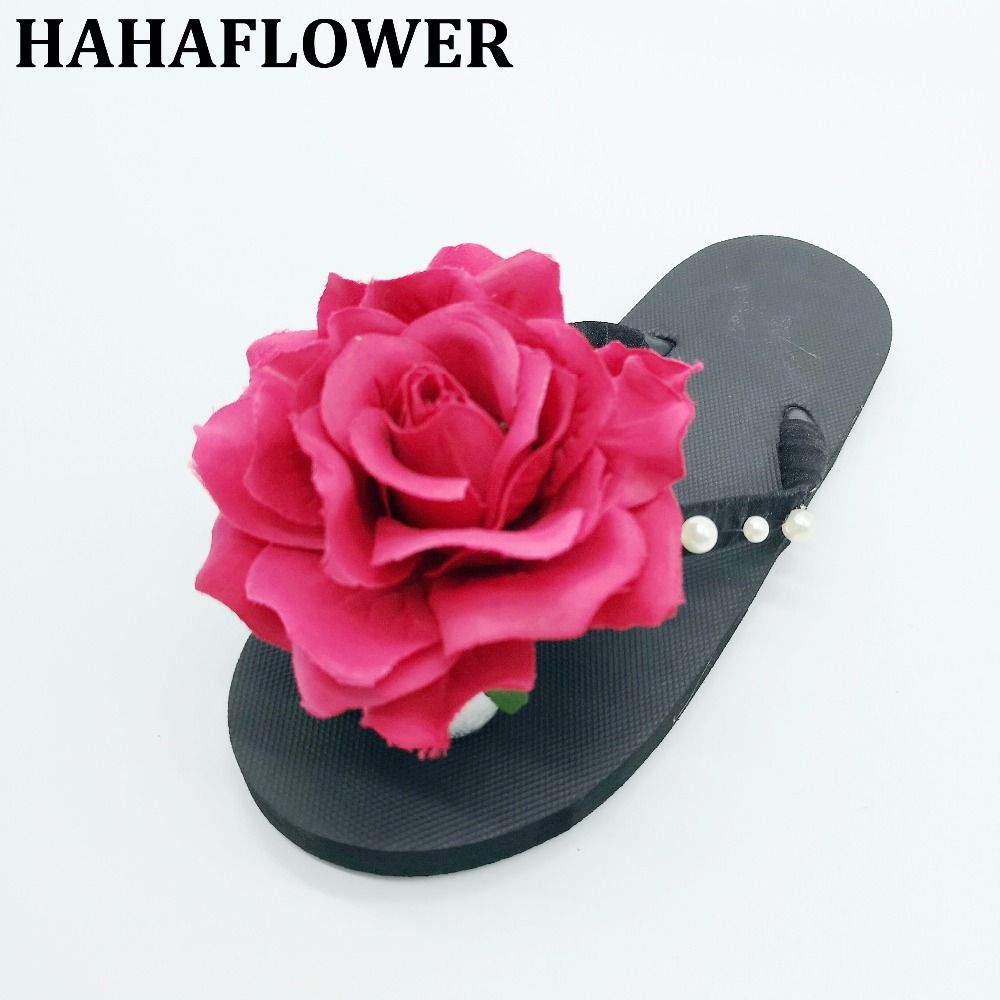 flip flops with big flowers on top