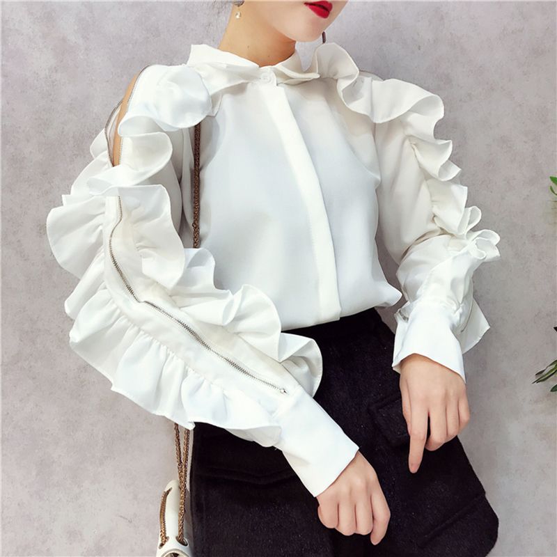 white shirt with ruffles on sleeves