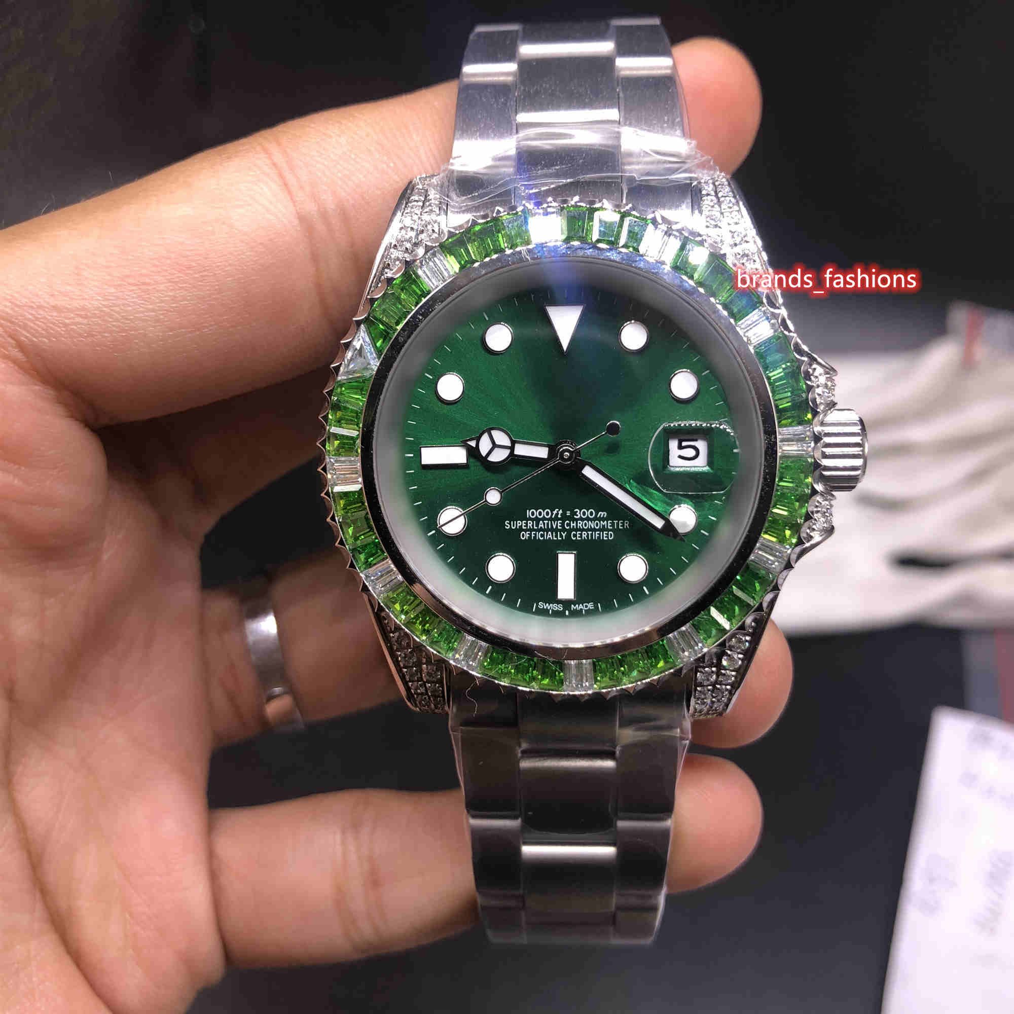 silver watch green face