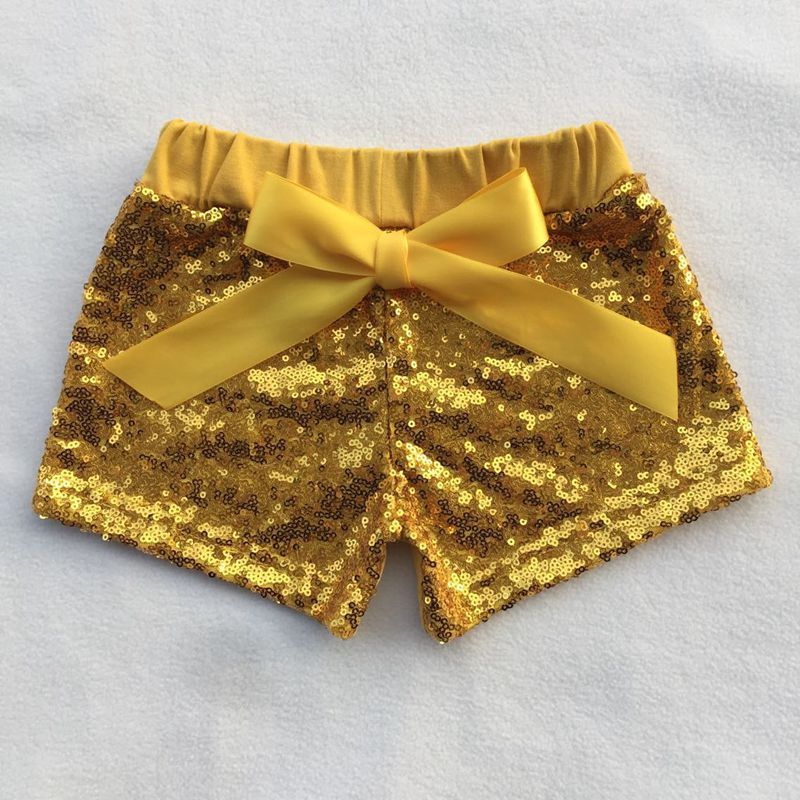 gold sparkly shorts