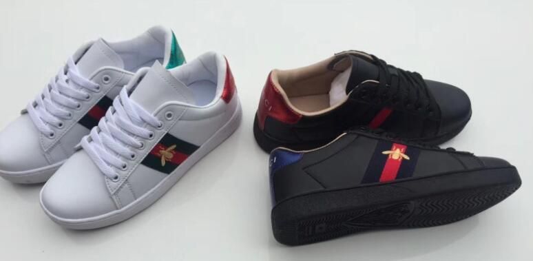 gucci shoes black and gold