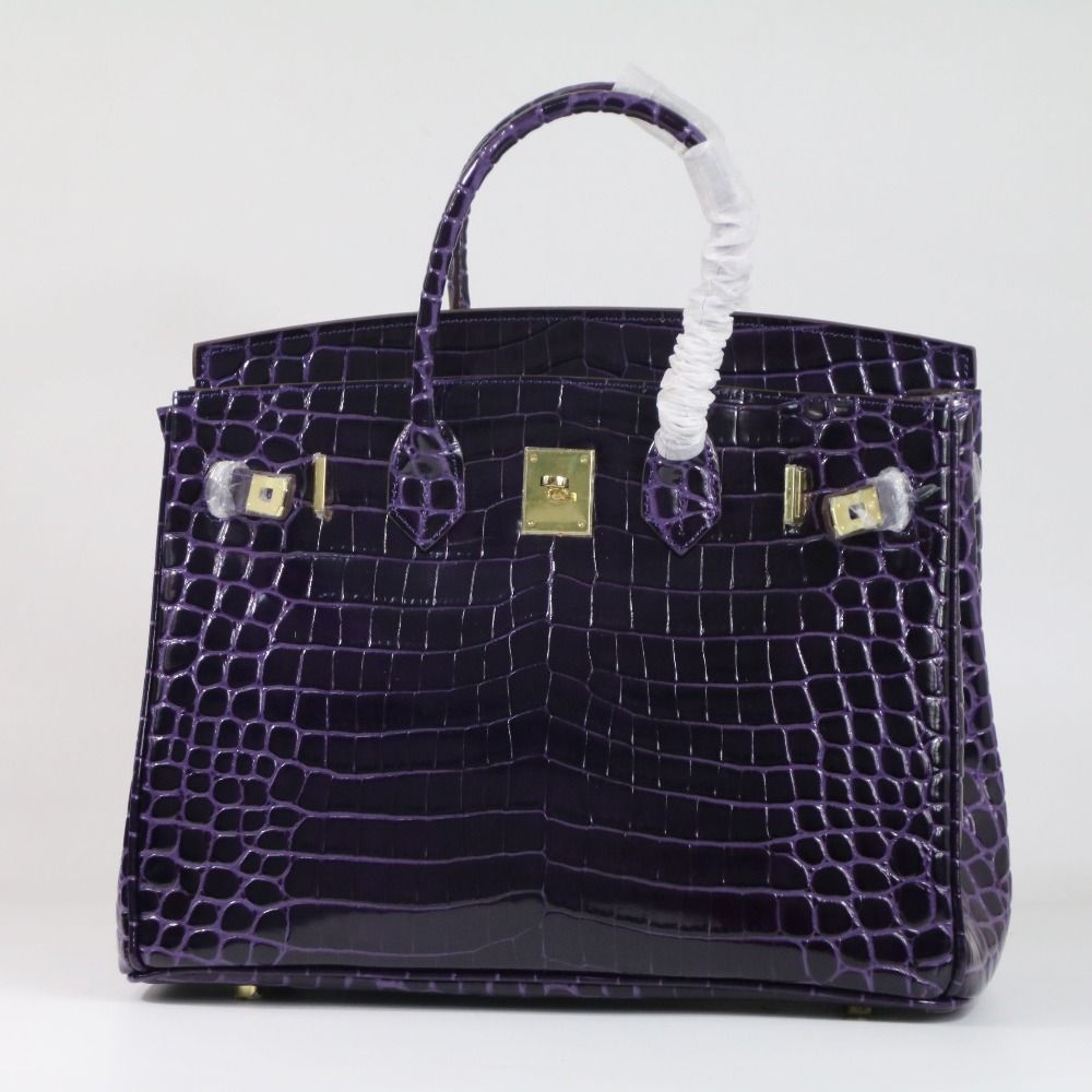 purple croc bag