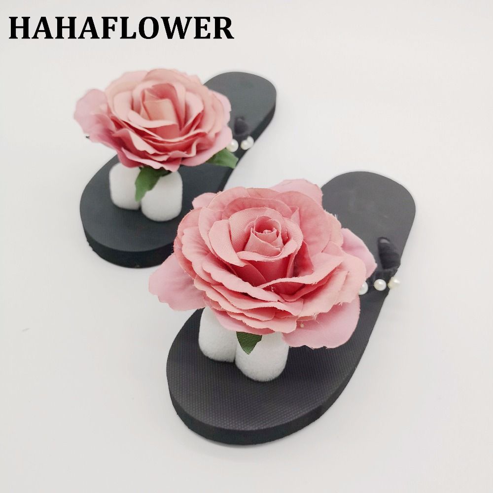 flip flops with big flowers on top