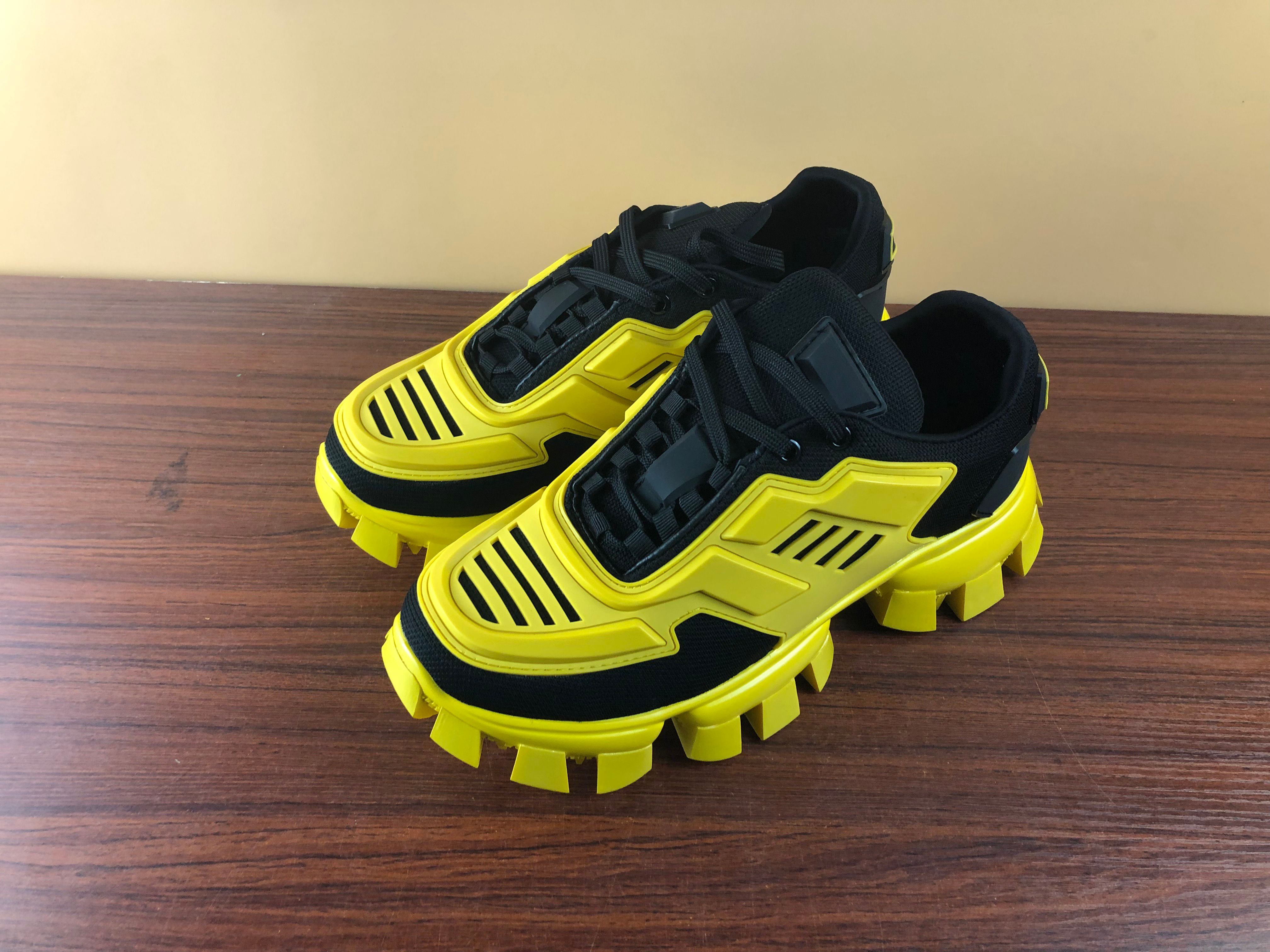 yellow and black designer shoes