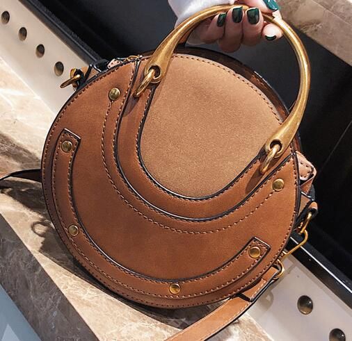 dooney and bourke purple leather handbolsa