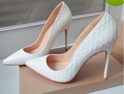 white pointed high heels
