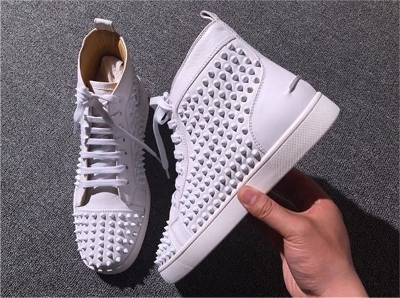 all white red bottoms with spikes