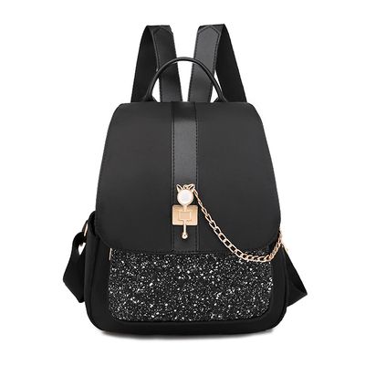 small cloth backpack purse