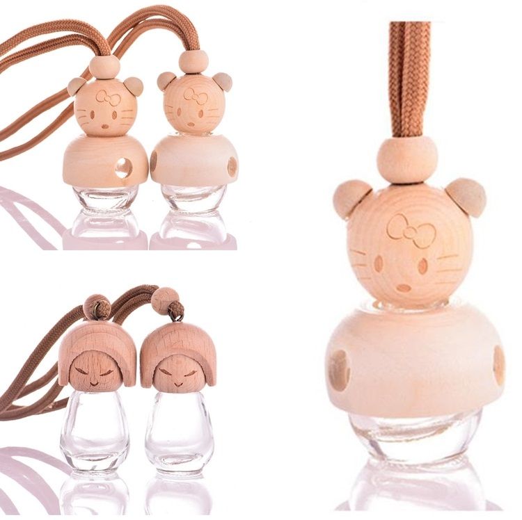 little dolls in perfume bottles