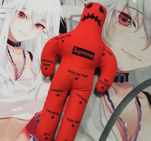 red voodoo doll