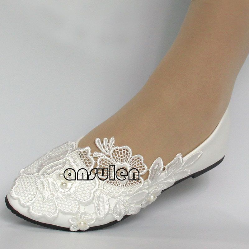 white flat slip on shoes