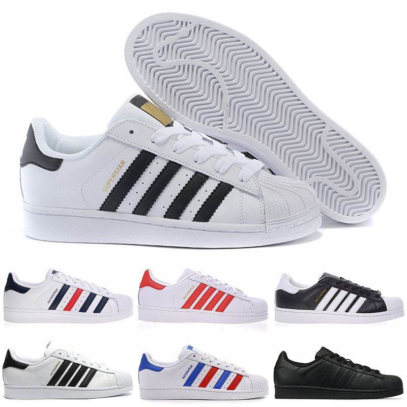 white and gold superstars