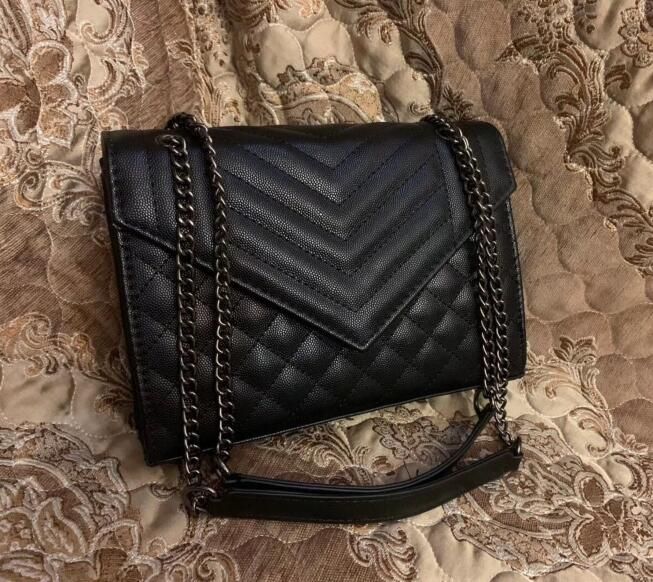 black and gold designer bag