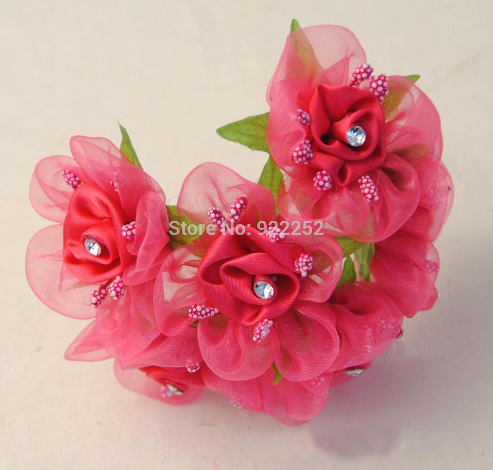 Roses of satin ribbons (photo). How to make a rose with your own hands 67 Roses of satin ribbons (photo). How to make a rose with your own hands 70