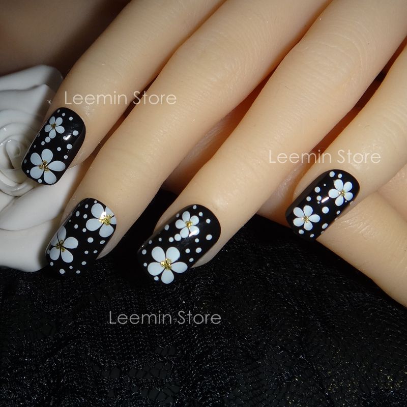 White Floral Flower Nail Art With Silver Rhinestones On A French