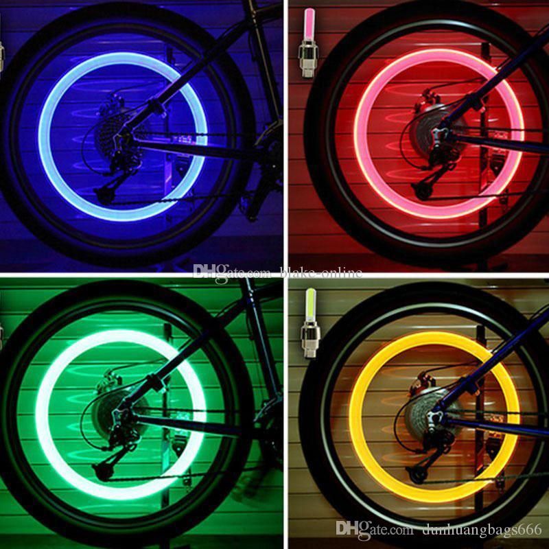 LED NEON BIKE CAR WHEEL TYRE VALVE DUST CAP CAPS SPOKE LIGHTS SAFETY