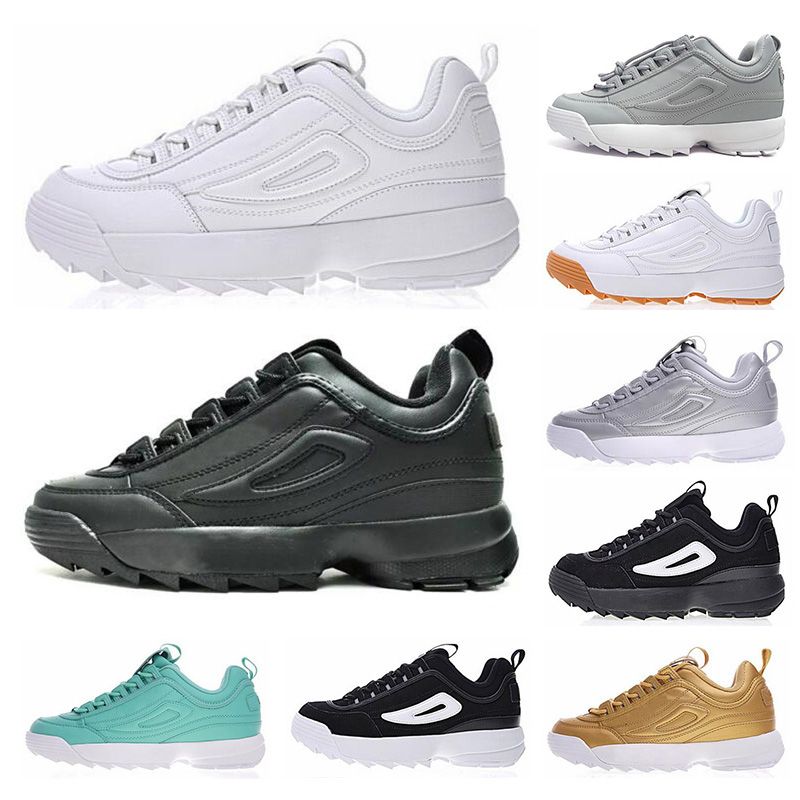 bambas fila negras y doradas