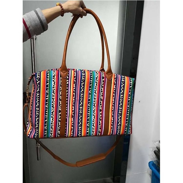 red and black plaid bag