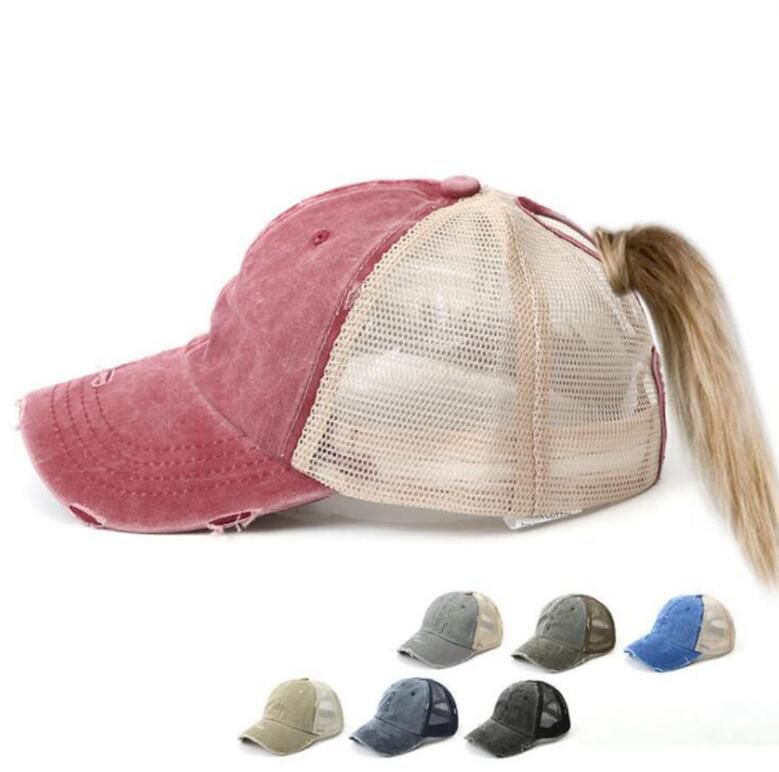 messy bun with baseball cap