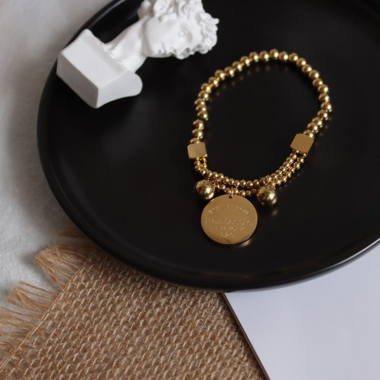 Bracelet de perles de boule d'acier inoxydable pour les femmes Bracelet de brin extensible de charme d'étiquette de cercle 