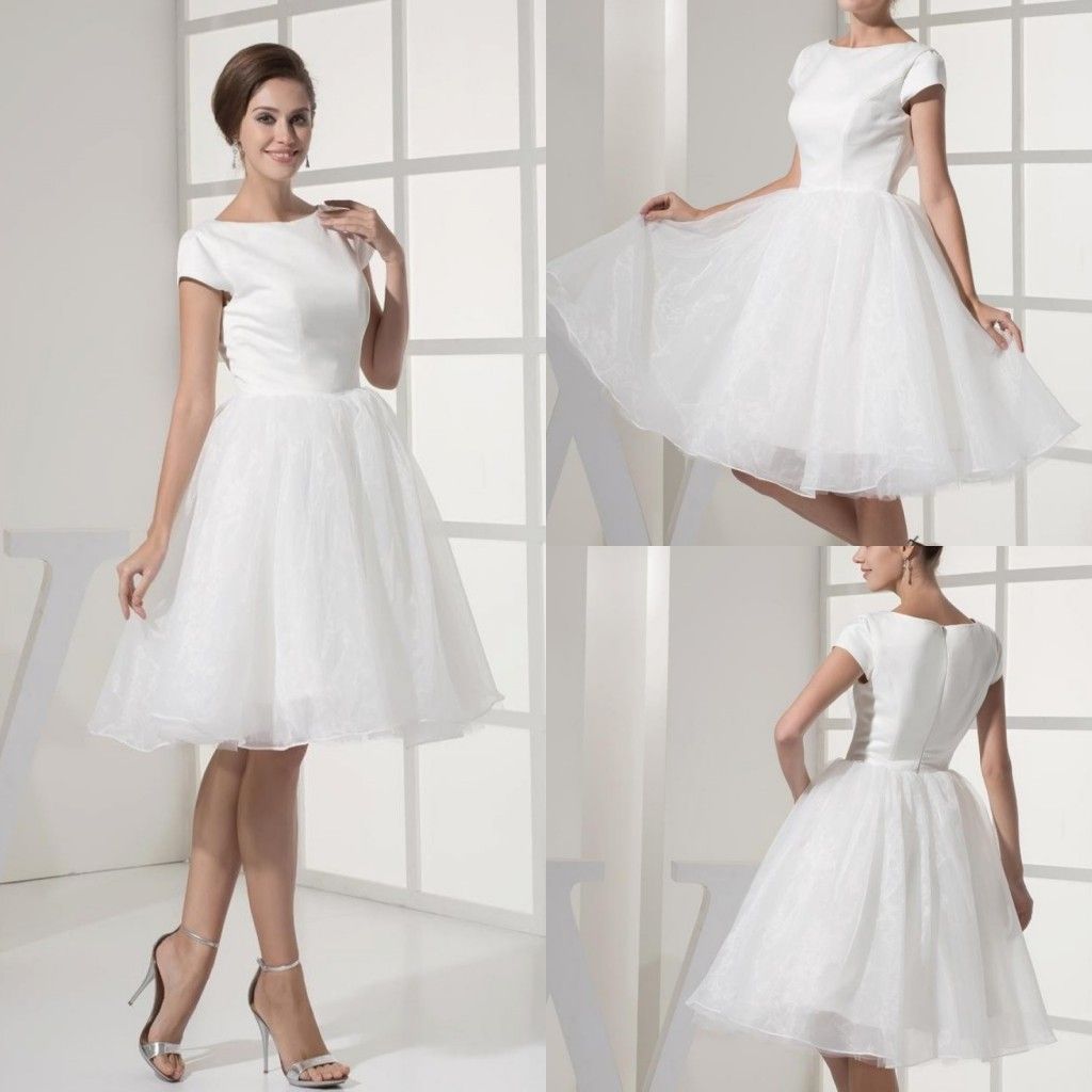 simple white knee length dress