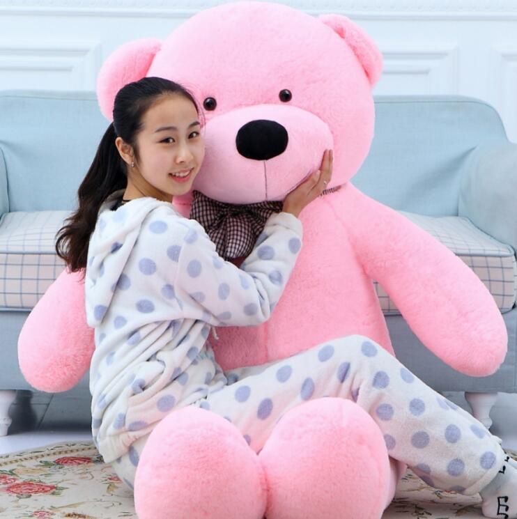 giant teddy bear with girl