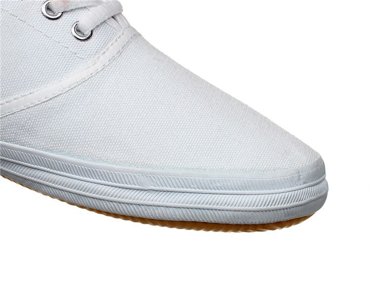 all white non canvas shoes