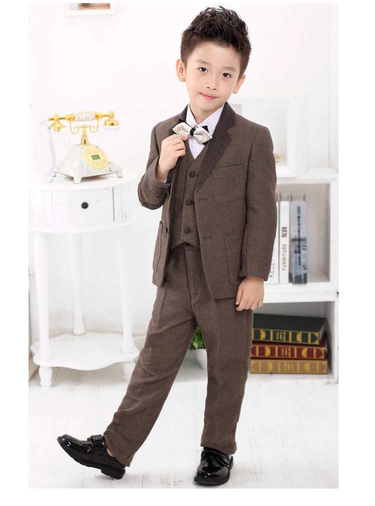 Shop boy's clothes including suits, suit separates, dress shirts, dress pants, dress shoes and more. Find suits for boys at Men's Wearhouse.