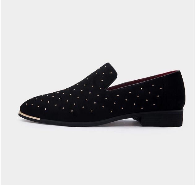 black loafers gold spikes