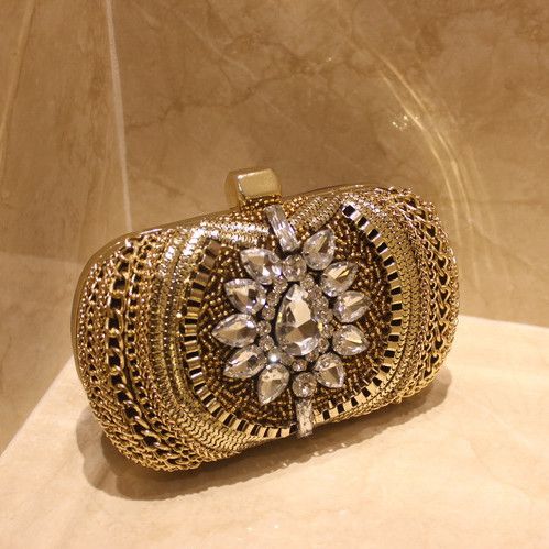 gold designer clutch