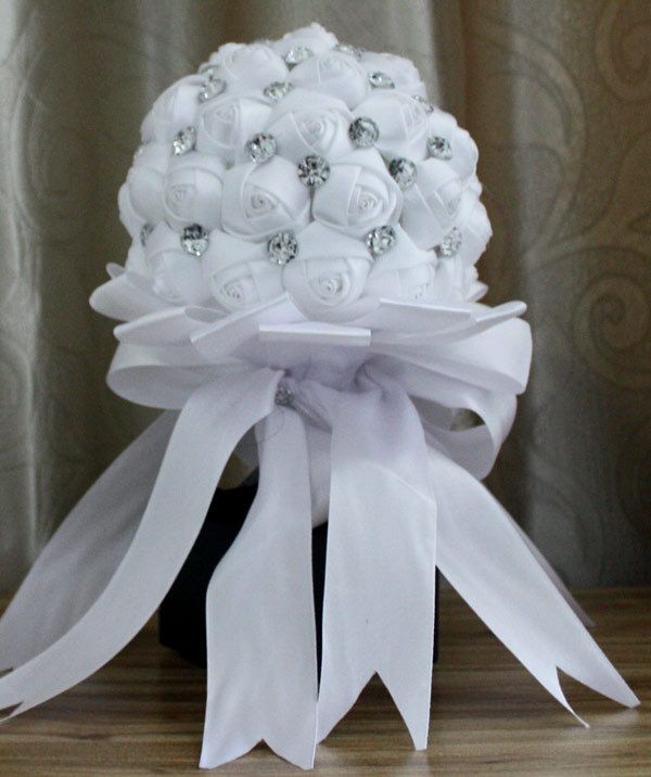 pink red white bouquet of flowers with crystal