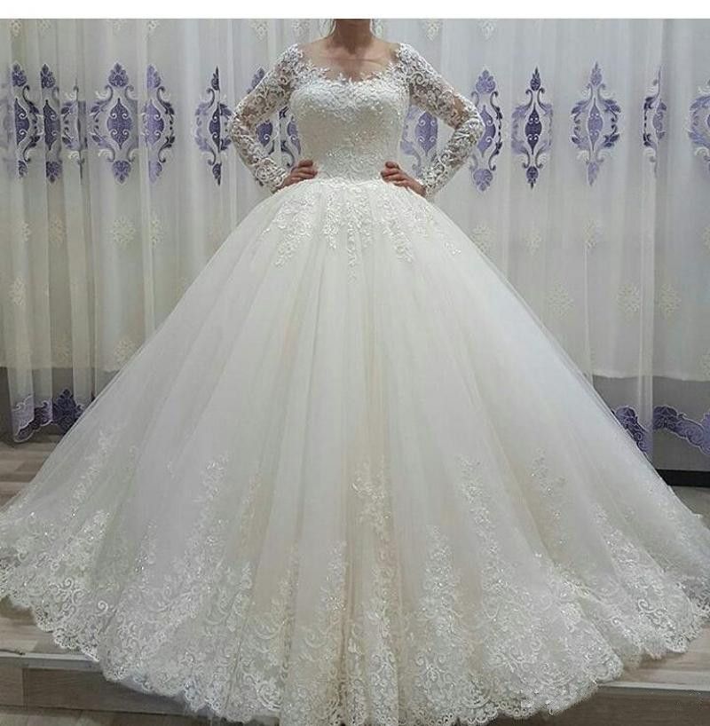I am confused to choose one  Long-sleeve-lace-wedding-dress-2017-ball
