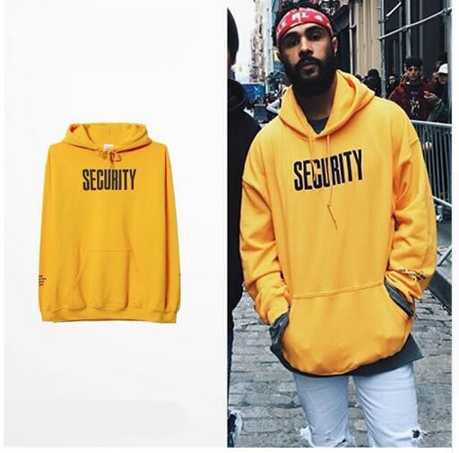 purpose tour yellow sweater
