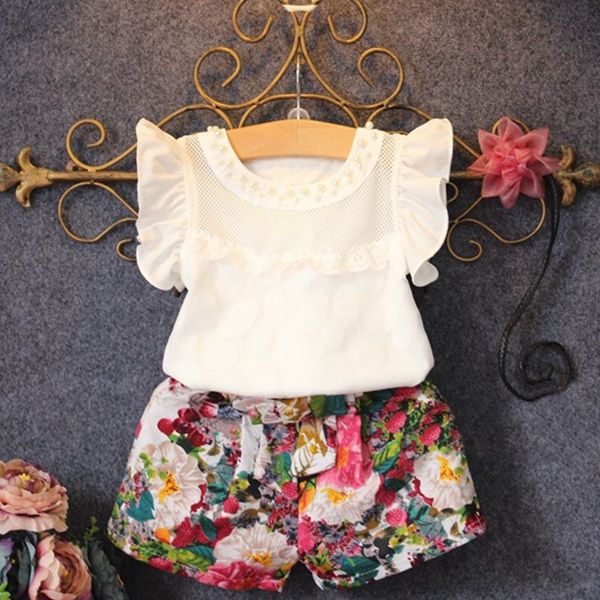 Acheter Pas Cher Nouveau Mode Mignon Bebe Filles Ensemble De Vetements Ete Petale Manches T Shirt Haut Et Floral Shorts Petites Filles Ensemble Du 6 92 Fr Dhgate